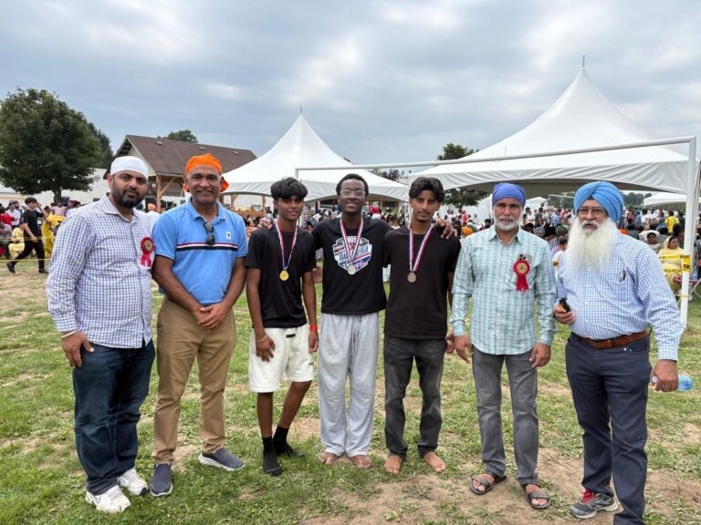 Sumit Sehli with neighbours and community members in Kitchener Ward 5, photo 40 of 71