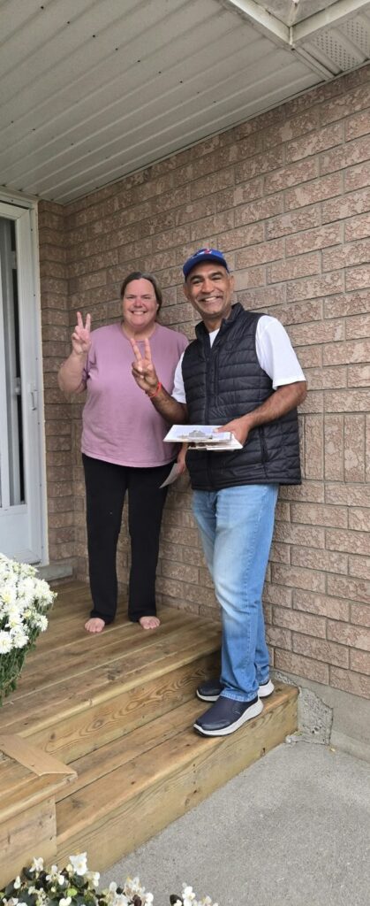Sumit Sehli with neighbours and community members in Kitchener Ward 5, photo 61 of 71
