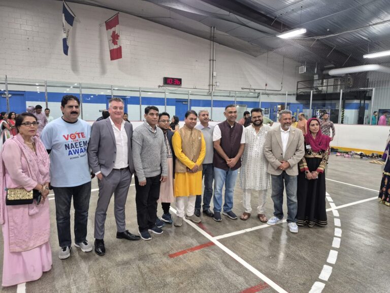 Sumit Sehli with neighbours and community members in Kitchener Ward 5, photo 66 of 71
