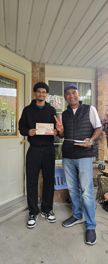 Sumit Sehli with neighbours and community members in Kitchener Ward 5, photo 70 of 71