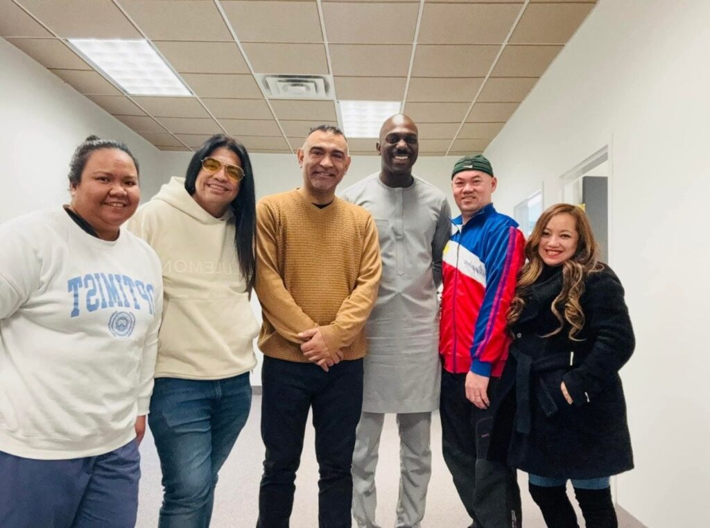 Sumit Sehli with community members at a local gathering
