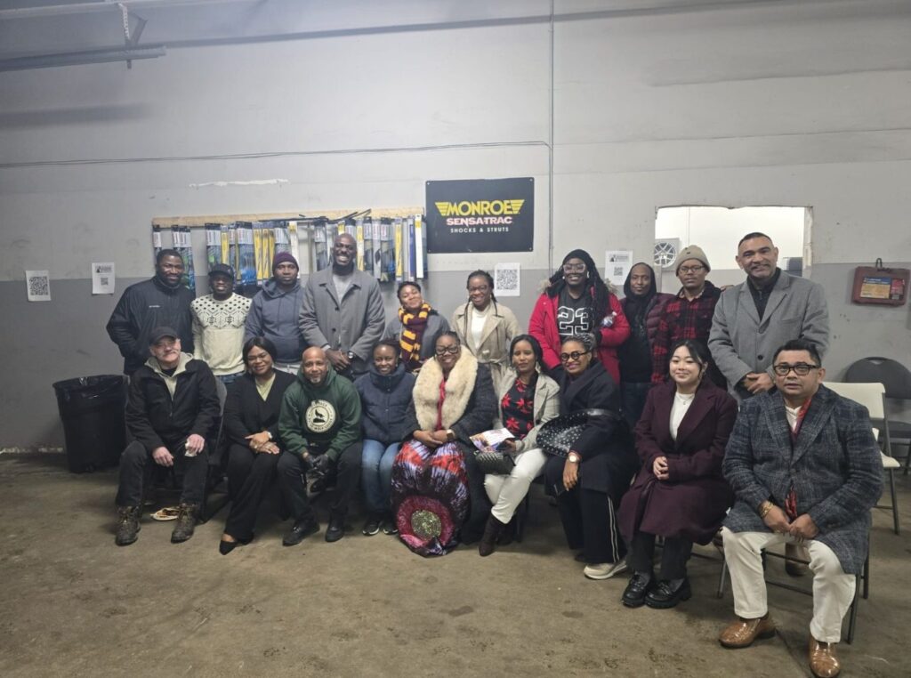 Sumit Sehli with residents at a community meeting