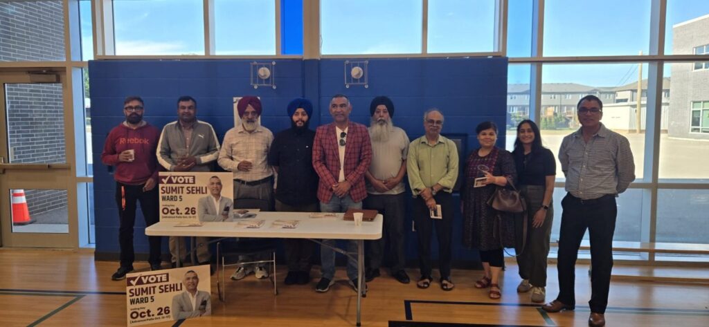 Sumit Sehli with supporters at a Ward 5 campaign event